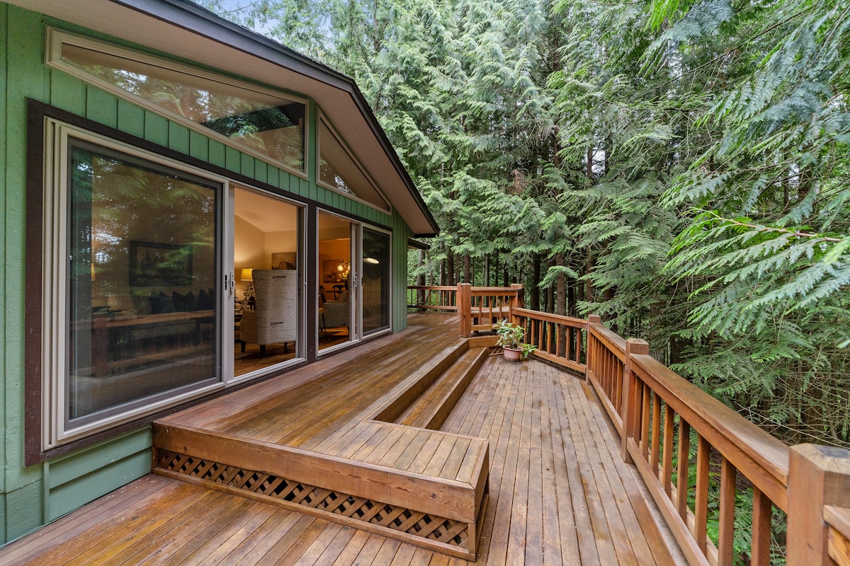 Wooden deck terrace outside a glass door